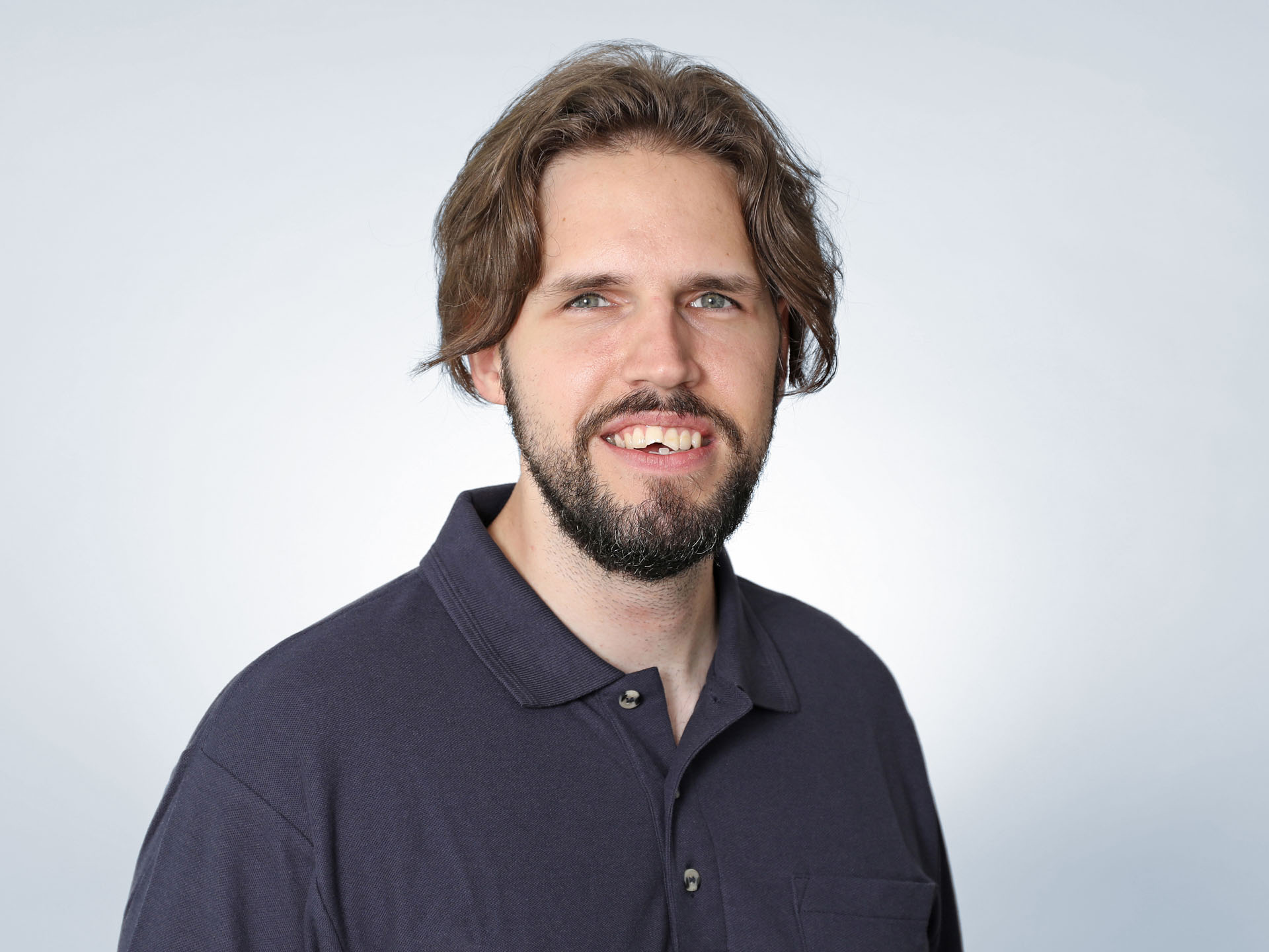 Philipp Schulte lachend, Portraitbild